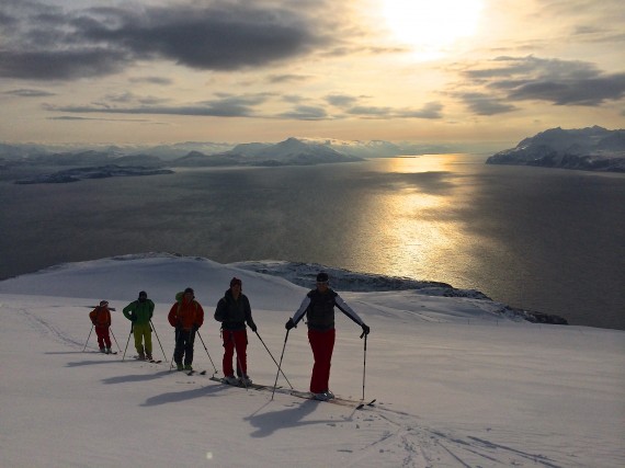 On our way to Trolltinden on Arnøya with the Lyngen fjord in the background.